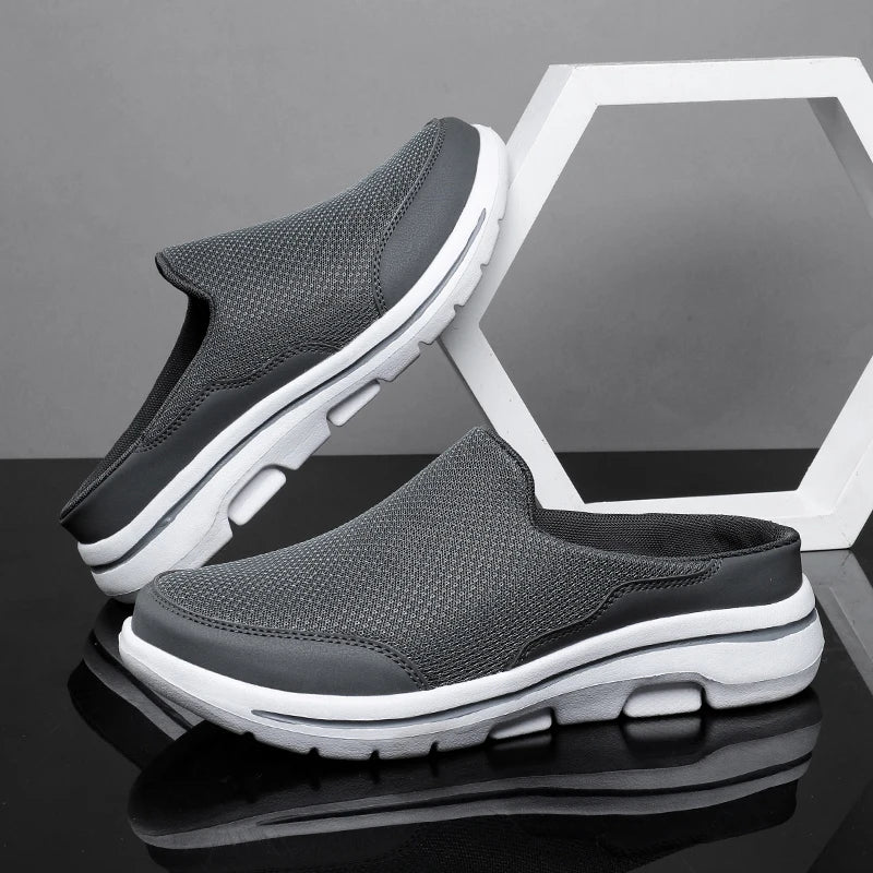 Modern men's closed-toe slip-on mule sandals, combining ease of wear with a comfortable casual style.