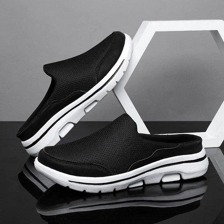 Durable men's closed-toe slip-on mule sandals, ideal casual footwear for summer comfort and style.