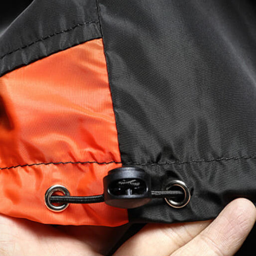Versatile men's color block hooded windbreaker. Half-zip jacket for casual outings or sports, lightweight outerwear.