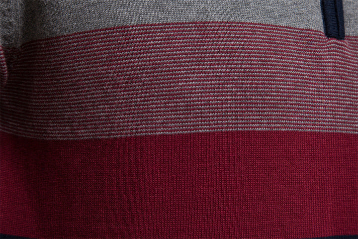 Men's half-zip sweater with rich colorblock hues, a statement piece in mens fashion