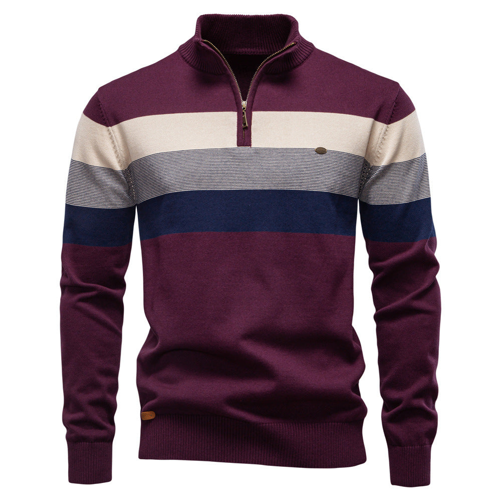 Detailed shot of the half-zip closure on a men's colorblock pullover, quality zipper