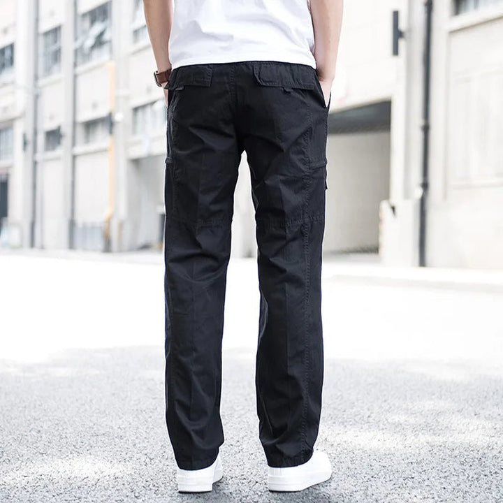 Black men's sleek stretch utility cargo pants, ideal for casual, comfortable, and versatile everyday adventures.
