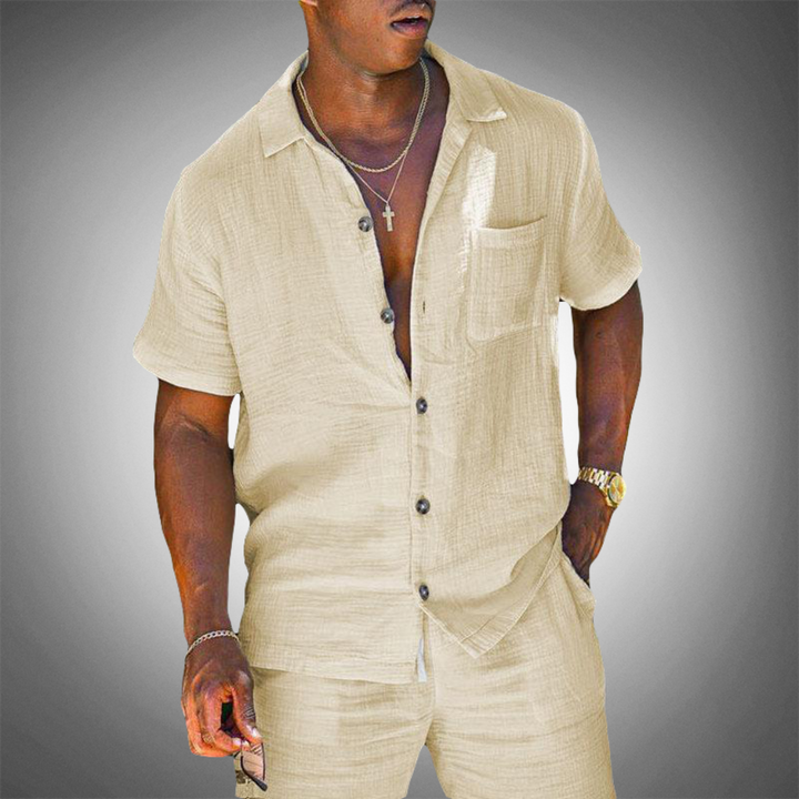 Men's breathable white knitted two-piece summer set. Relaxed fit casual outfit for spring fashion or beach vacation.