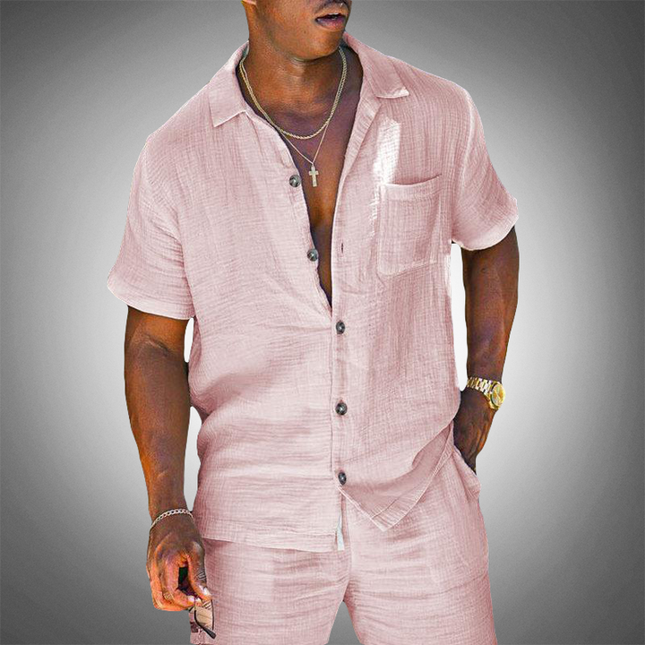 Pink men's two-piece knitted summer set, comfortable & breathable polyester blend. Ideal casual outfit for spring & summer.