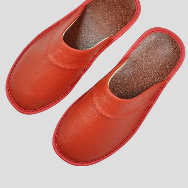 Easy slip-on men's cozy house shoes, offering comfort footwear for lounging indoors with a classic style.