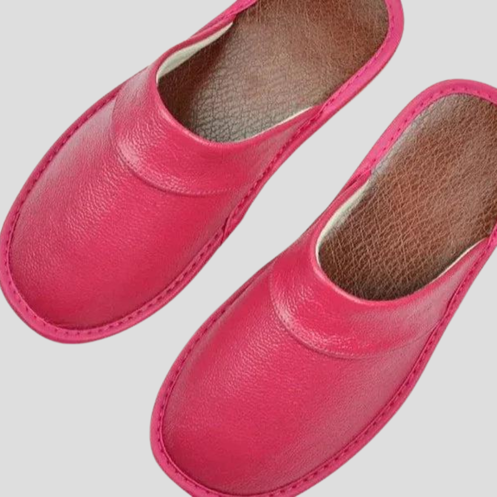 Soft, cozy men's indoor slip-on slippers, providing ultimate comfort for relaxing at home.
