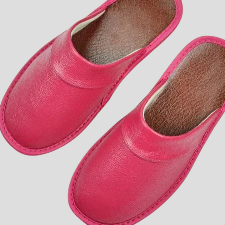 Soft, cozy men's indoor slip-on slippers, providing ultimate comfort for relaxing at home.