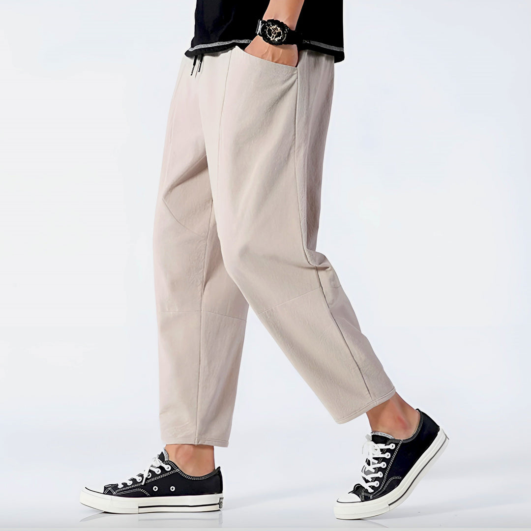 Men's casual cropped drawstring chino pants, perfect for comfortable leisure.