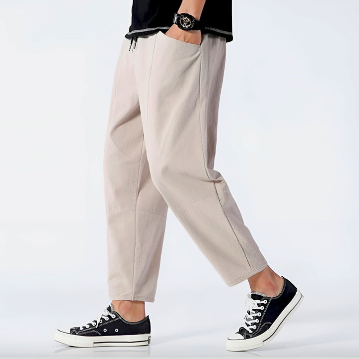 Men's casual cropped drawstring chino pants, perfect for comfortable leisure.