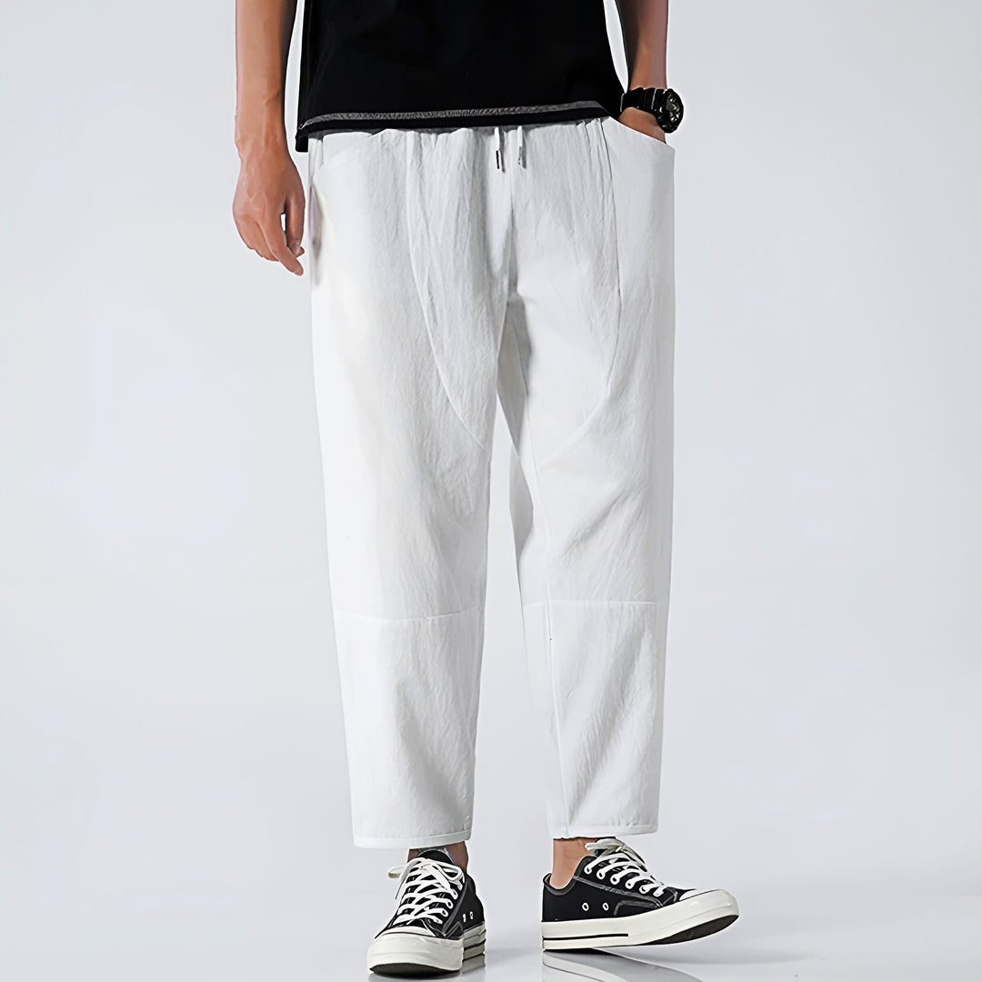 Indigo men's relaxed fit cropped drawstring pants, versatile for casual style.