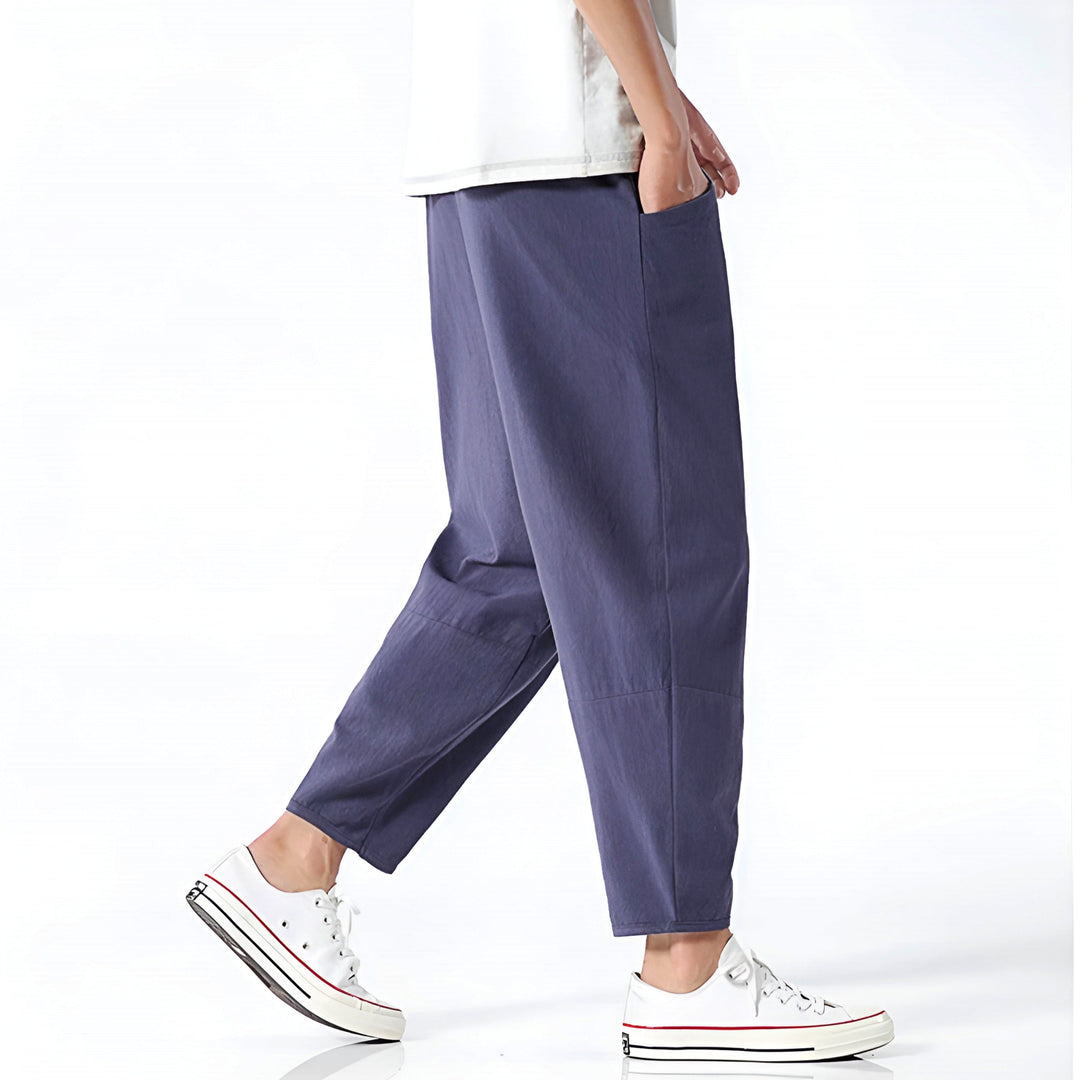 Indigo men's cropped drawstring pants, versatile for summer fashion & leisure.
