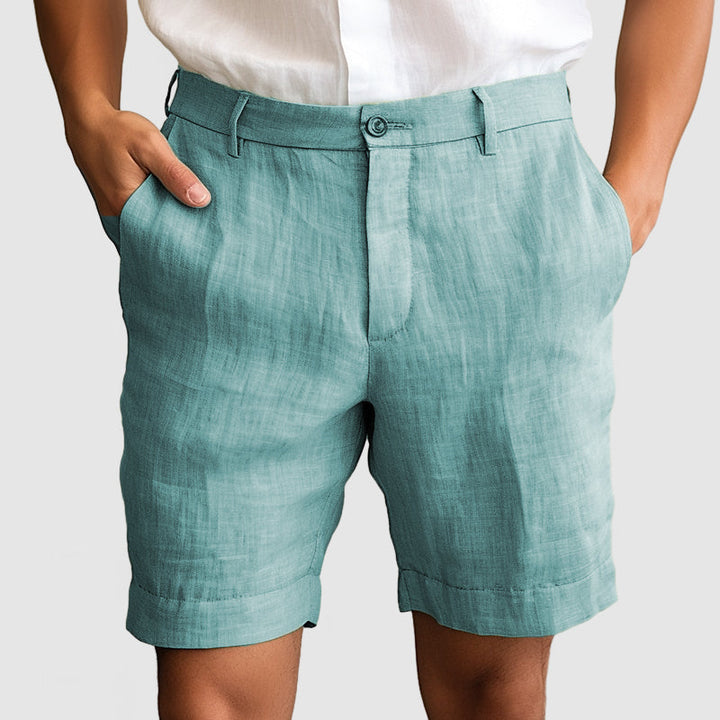 Chino dress shorts for men, featuring a smart flat front and fashionable cuffed hem.