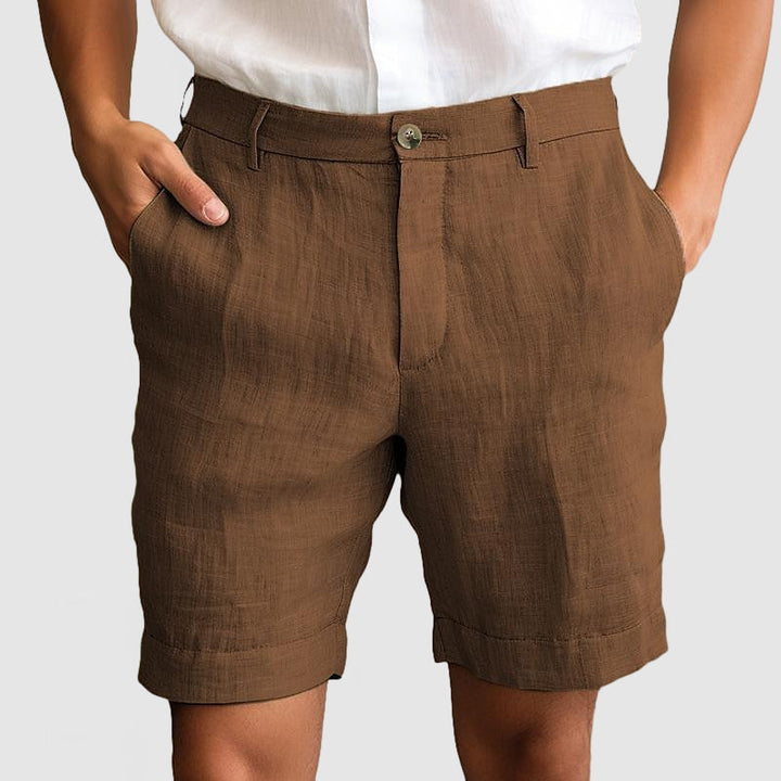 Men's flat front dress shorts, cuffed for a polished yet casual summer style. Perfect for smart occasions.