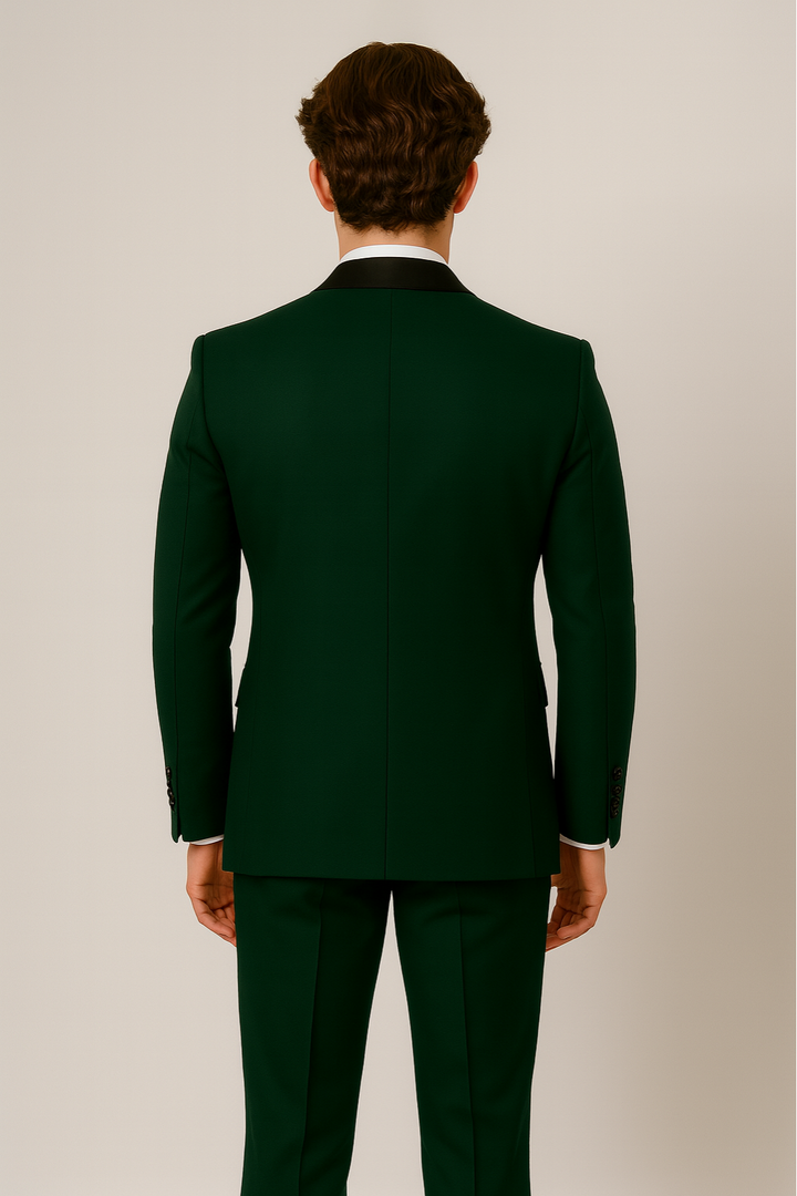 Close-up of men's dark green tailored three-piece suit showing fine fabric texture and contrast lapel details.