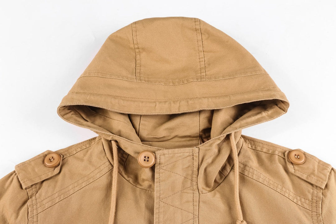 Detail of the button closure on a men's durable cotton utility jacket