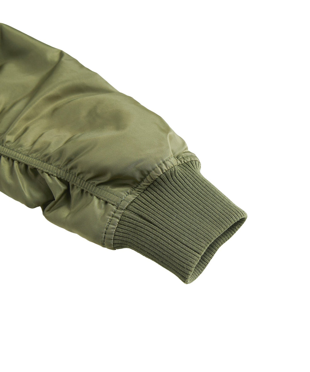 Man zipping up his men's durable bomber jacket, emphasizing its practicality and weather resistance.