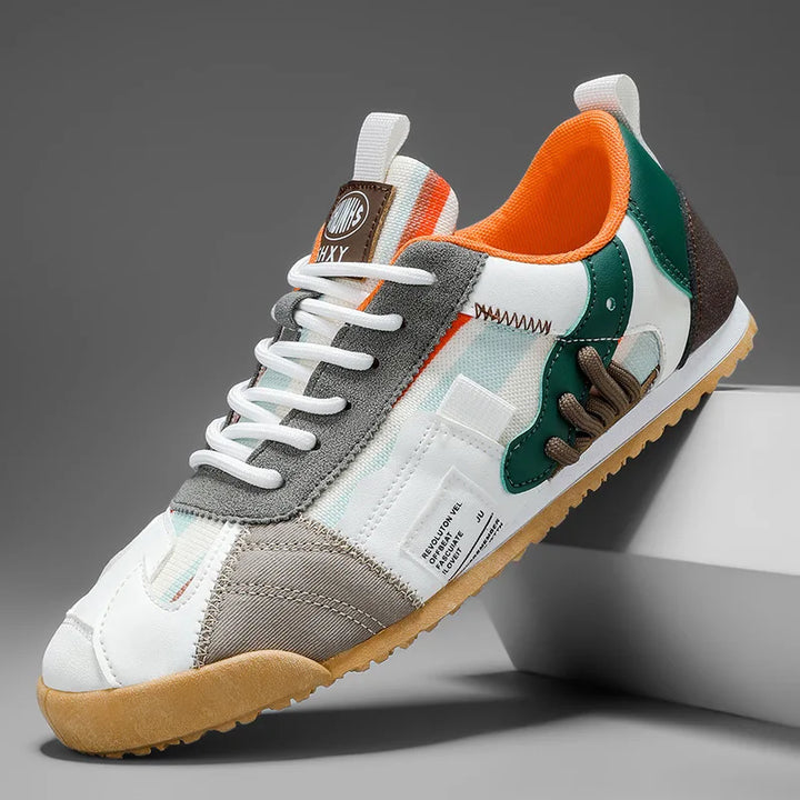 Side view of men's performance utility sneakers, highlighting sturdy design & comfortable sole for daily wear.