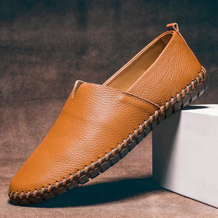 Premium men's matte finish slip-on loafers, combining elegance with everyday comfort footwear.