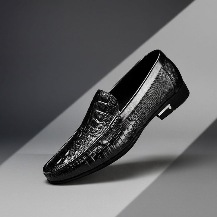 Modern men's slip-on loafers featuring an embossed design for enhanced style & comfort.