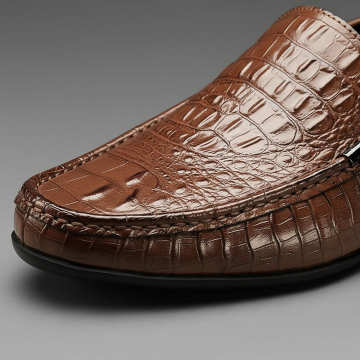 Embossed men's loafers: smart slip-on shoes offering comfort & effortless style.