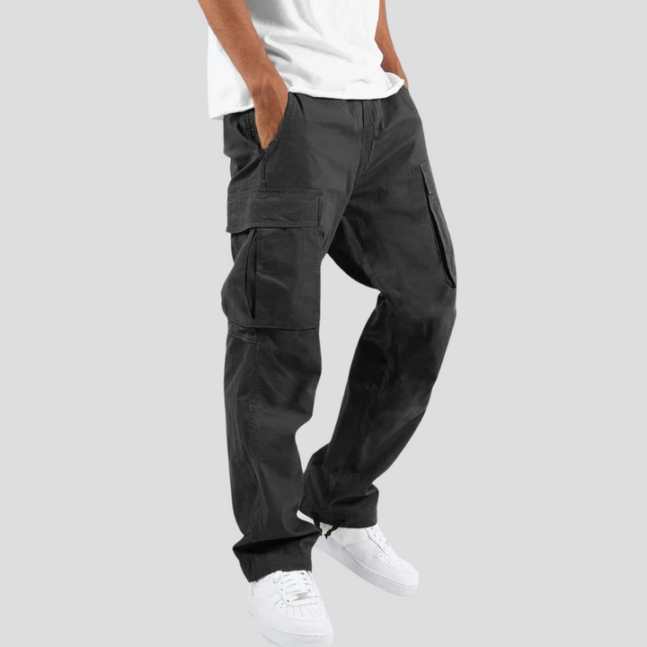 Relaxed fit men's cargo pants in a neutral color, showcasing multi-pockets and a durable fabric for daily, comfortable style.