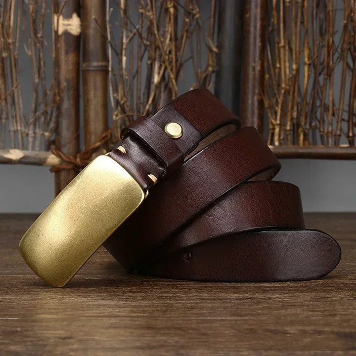 Elevate your look with this handcrafted full grain leather men's belt & its unique forged brass buckle.