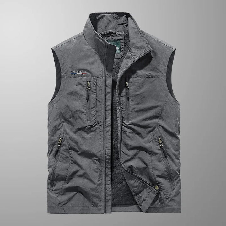 Men's versatile outdoor vest with full zip. Perfect activewear, featuring pockets, great for hiking & travel.