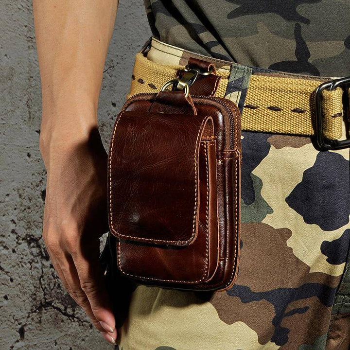 Hands-free men's leather bag, black, versatile fanny pack for travel & daily use.