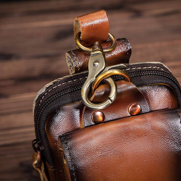 Stylish men's leather cross-body bag, brown, secure and hands-free travel solution.