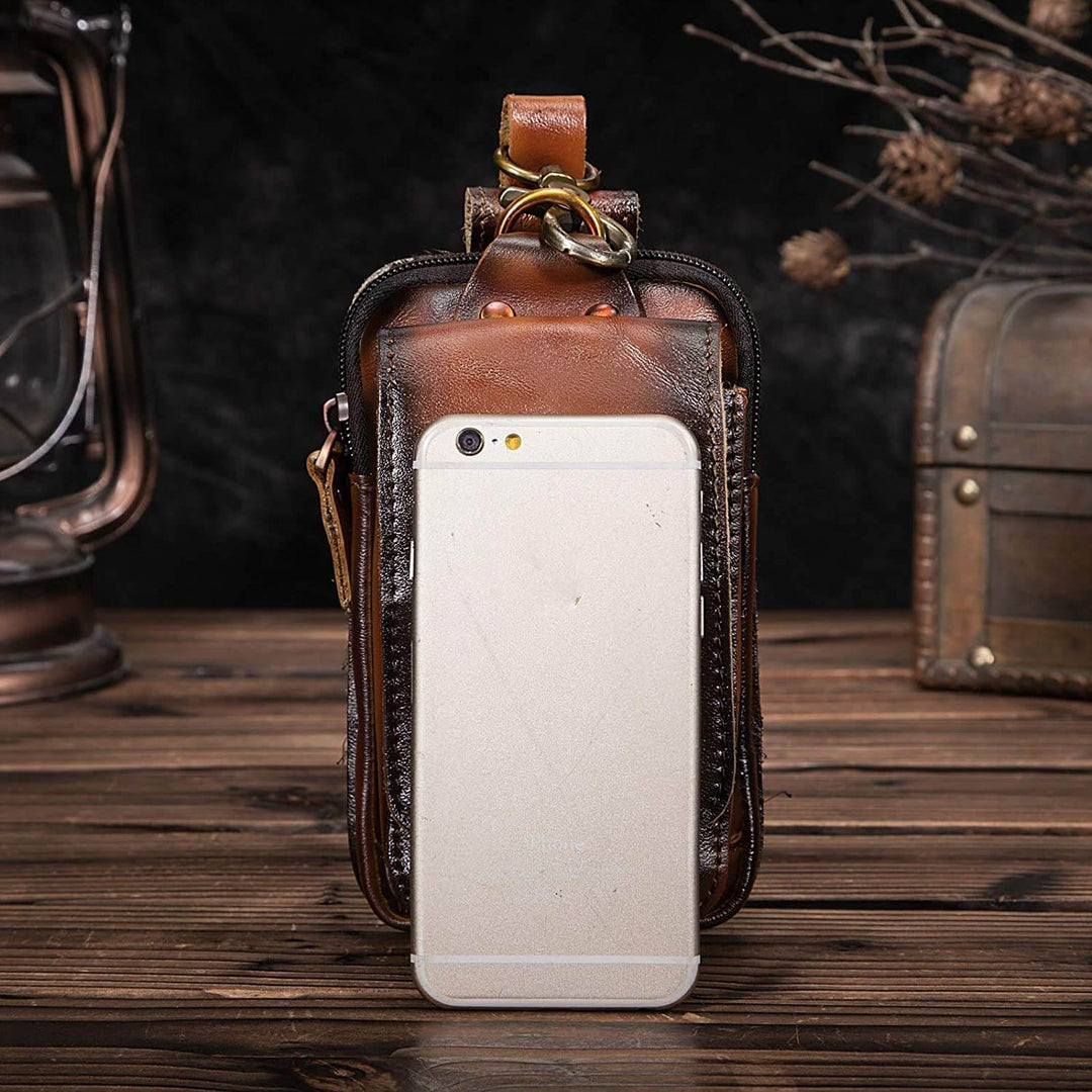 Dark brown men's leather waist pack, stylish and durable hands-free accessory.