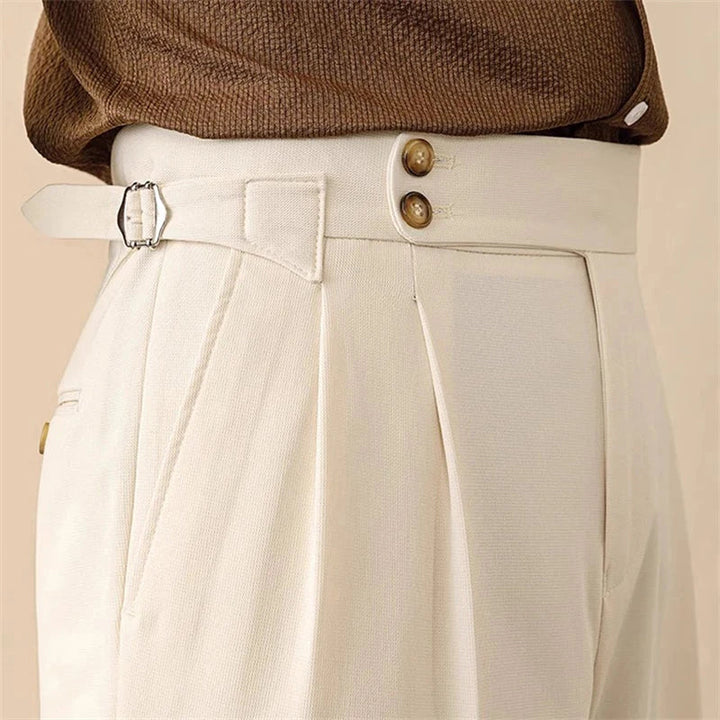 Men's high-waisted tailored trousers with stylish side buckle, perfect for formal or smart casual wear.