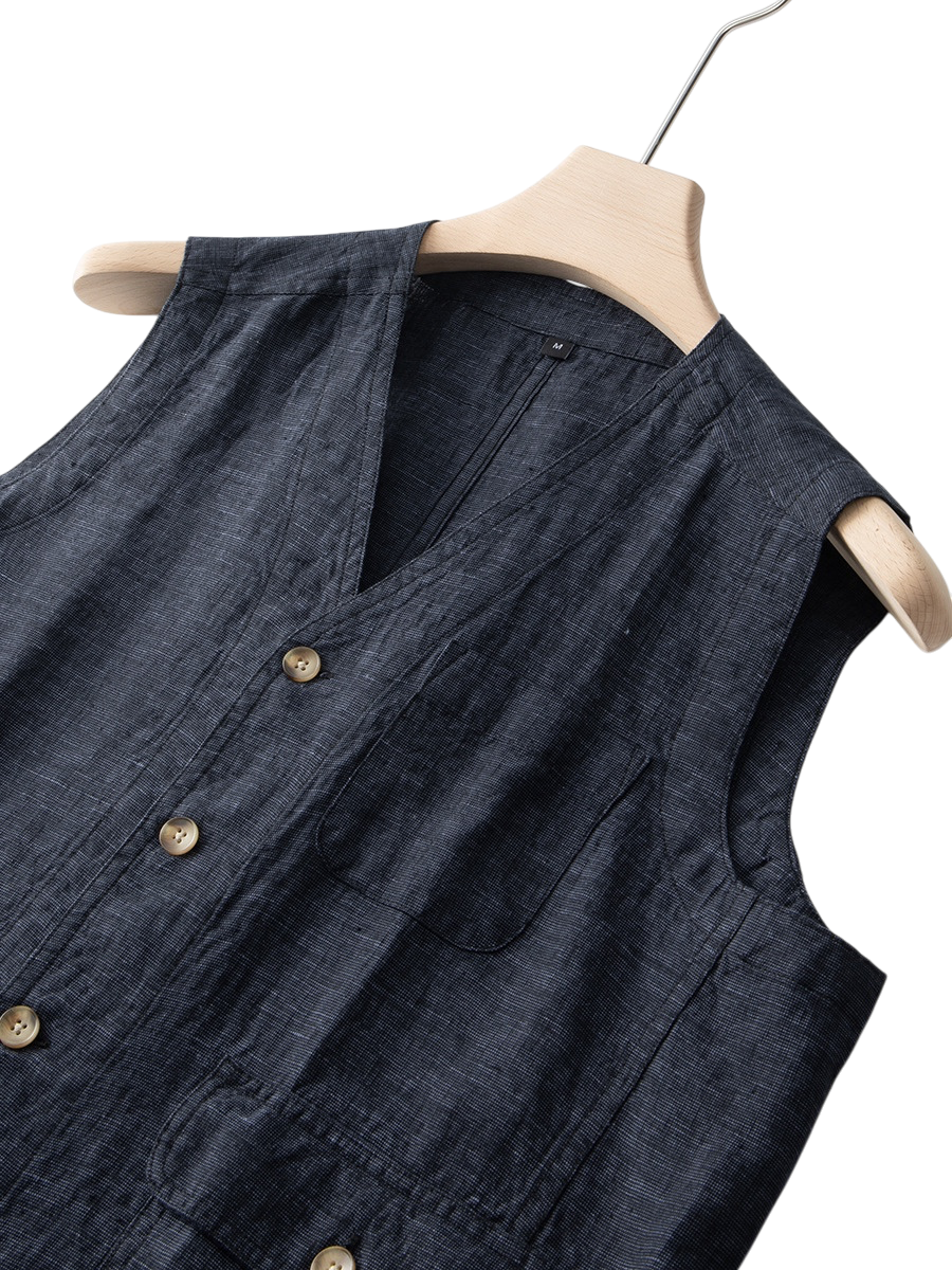 Men's sleeveless indigo linen vest, offering a casual chic and refined summer look.