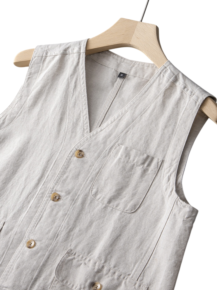 Breathable indigo linen vest for men, tailored fit, perfect for elevated summer comfort.
