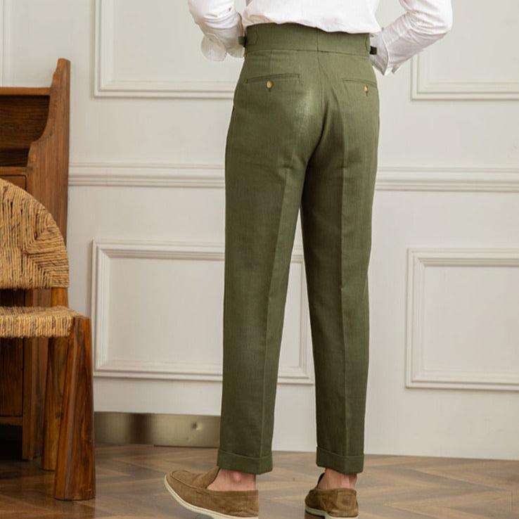 Elegant men's Italian style trousers, high-waisted with precise pleats, a timeless fashion choice.