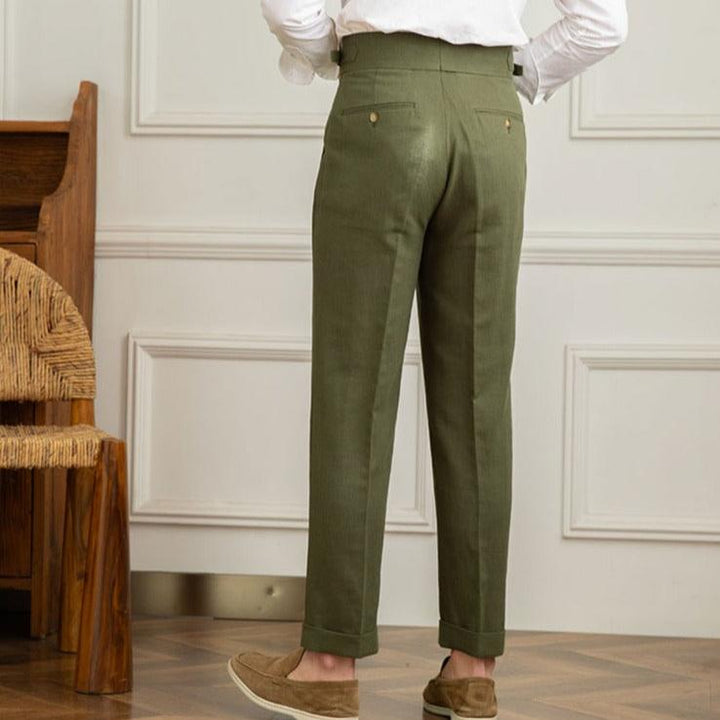 Elegant men's Italian style trousers, high-waisted with precise pleats, a timeless fashion choice.