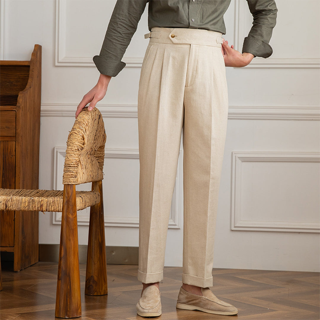 Classic men's high-waisted pleated dress pants, perfect for formal and smart casual wear.