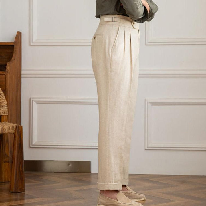 Tailored Italian style men's pleated trousers, offering a sophisticated high-waisted fit.