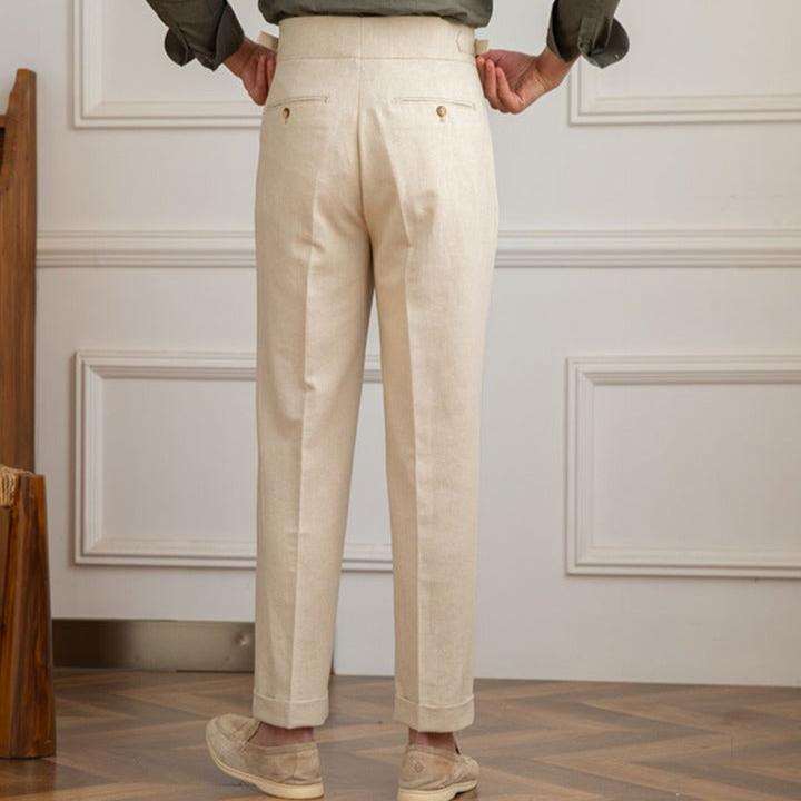 Elegant men's high-waisted trousers with pleats, ideal for office attire and special events.