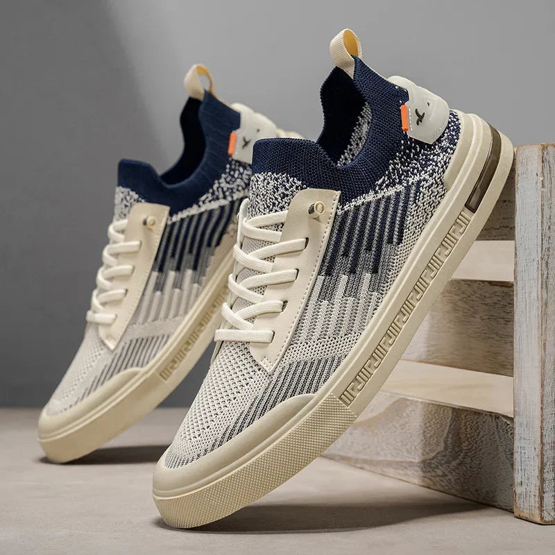 Men's lightweight black knit sneakers with white soles, perfect for casual street style & everyday comfort.