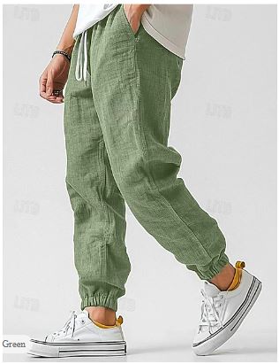 Comfortable men's lightweight pants with breathable fabric, tapered leg & elastic waist. Great for everyday wear.