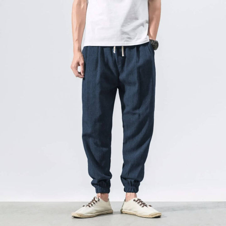 Relaxed fit men's drawstring pants, great for summer activities and comfort.