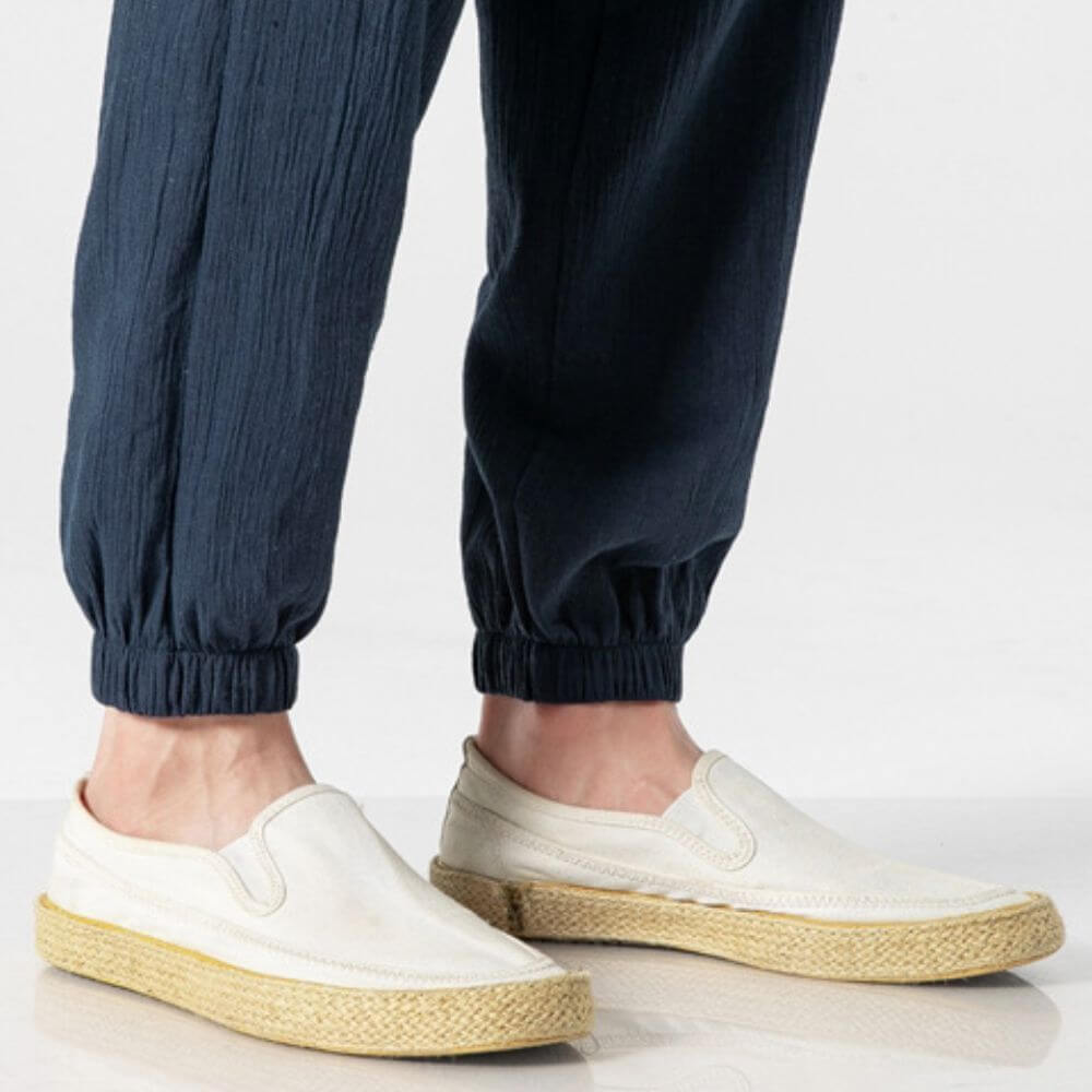 Comfortable men's summer pants with adjustable drawstring waist and relaxed fit.