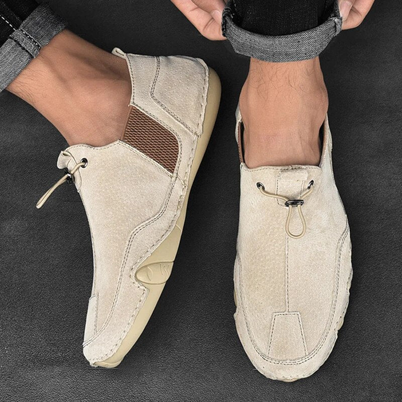 Men's lightweight slip-on loafers with adjustable comfort for casual wear & easy styling.