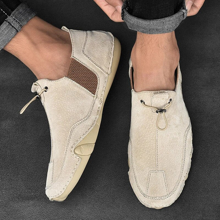 Men's lightweight slip-on loafers with adjustable comfort for casual wear & easy styling.