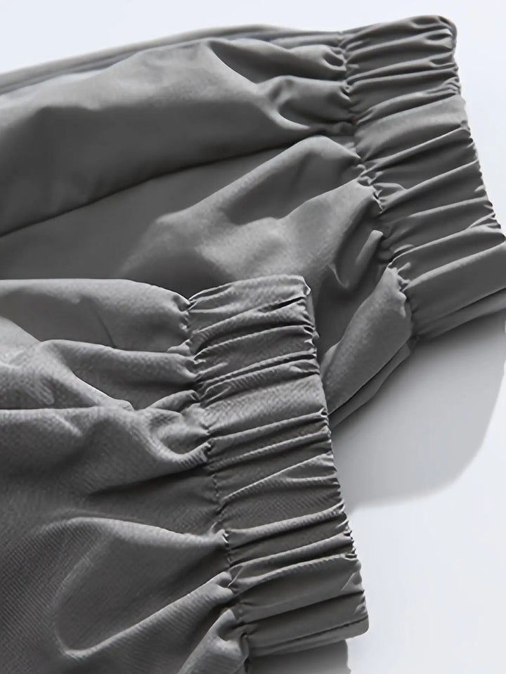 Side view of men's lightweight stand collar windbreaker. Casual outerwear, perfect for active or daily use.