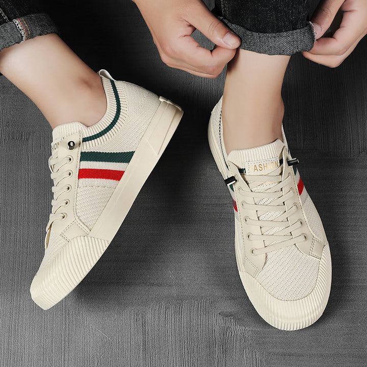Durable sole of men's lightweight urban comfort sneakers. Sandstone & black casual walking shoes for urban style.