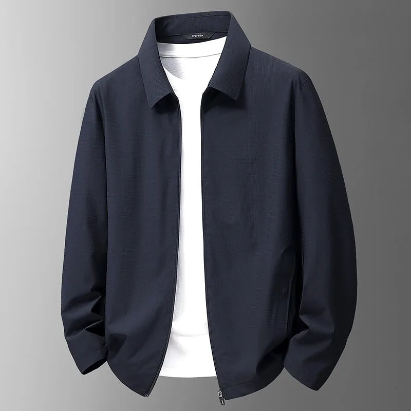 Breathable men's rain jacket, perfect for travel or daily commute, featuring a minimalist design.