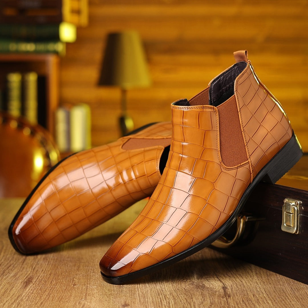 Black men's luxury croc-embossed leather Chelsea boots with slip-resistant sole, stylish dress boots for any occasion.