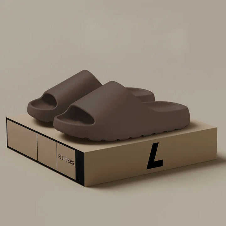 Minimalist black men's sandals, comfortable and stylish open-toe slides for summer and spring footwear.