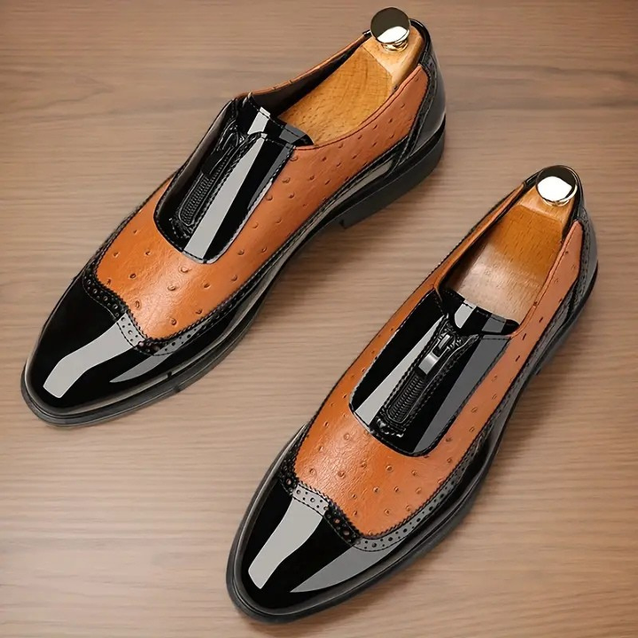 Full view of men's navy blue modern Oxford dress shoes with subtle side zip. Formal & elegant mens fashion.